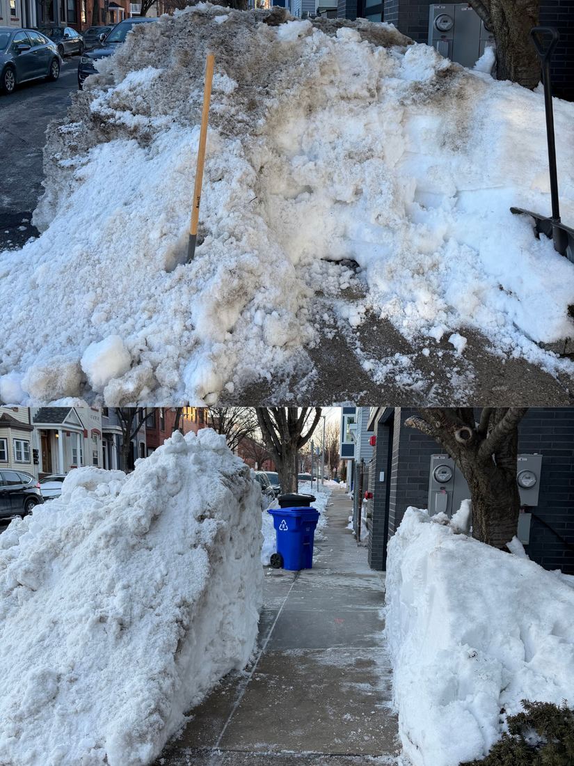 Sidewalk cleared to a full walking path after a large snowfall